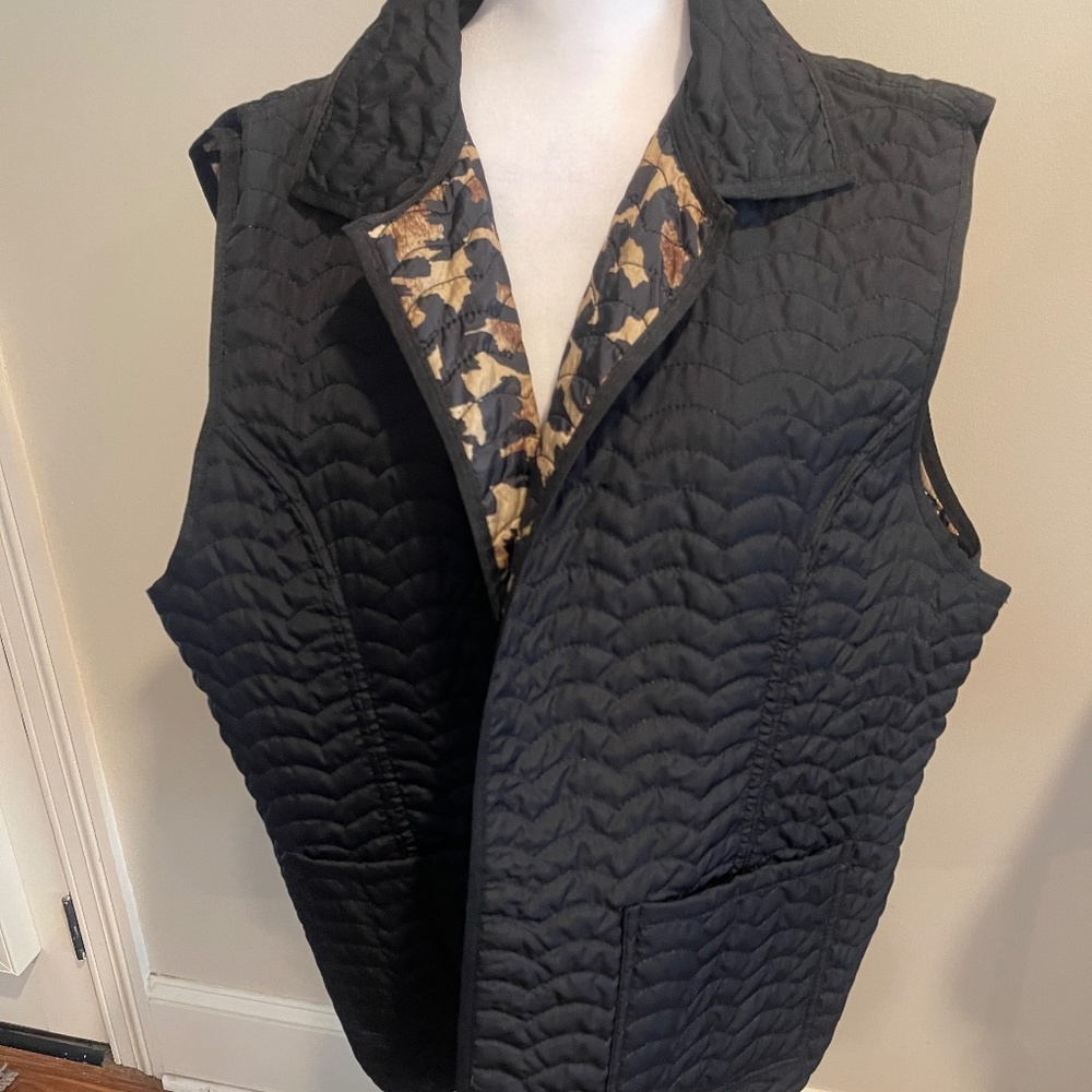 Fun and sporty plus size black and leopard women's quilted vest. Never worn.